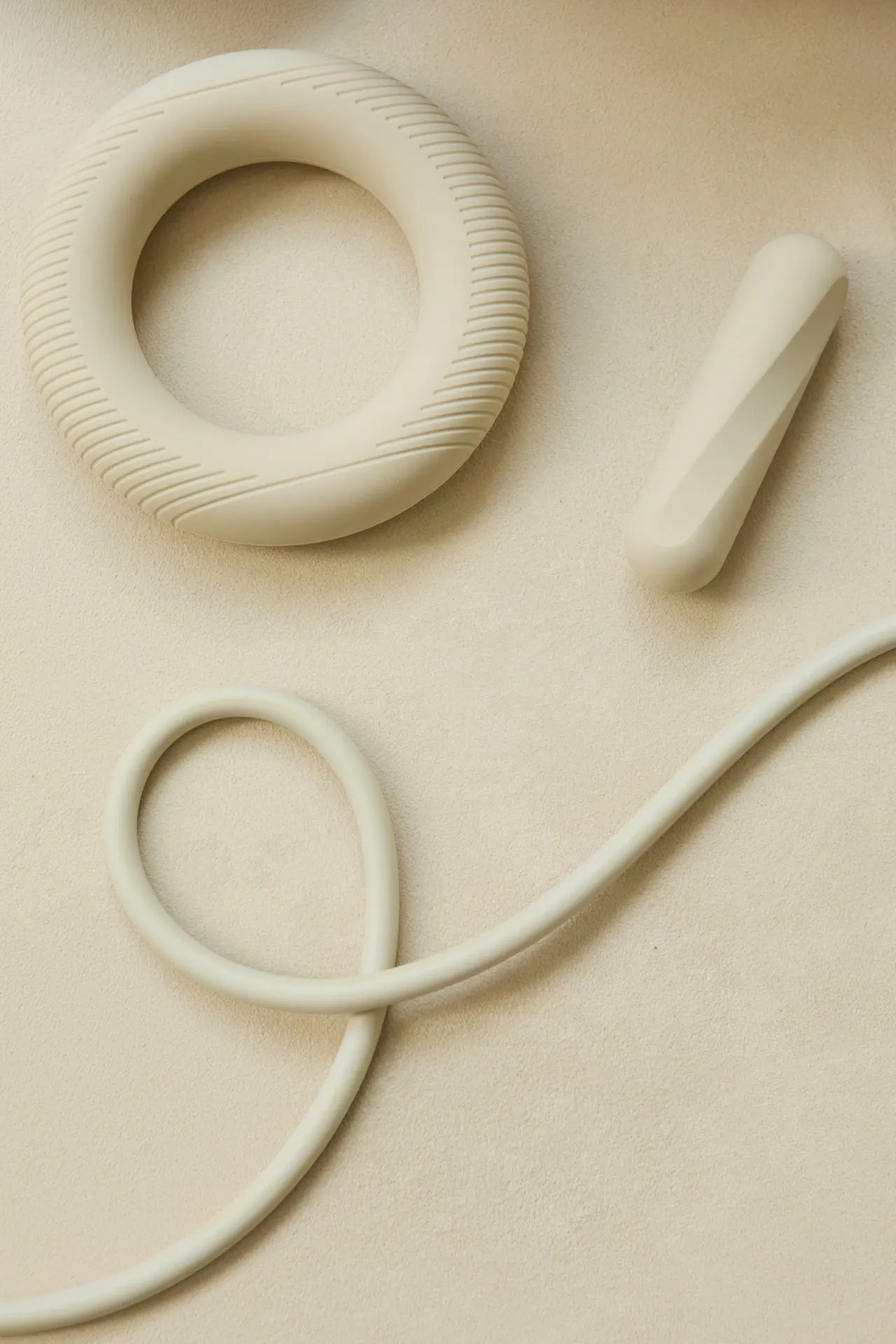 Curved beige clay shapes